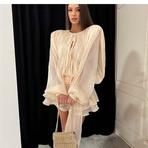 Elegant Cream Dress with Flowing Sleeves